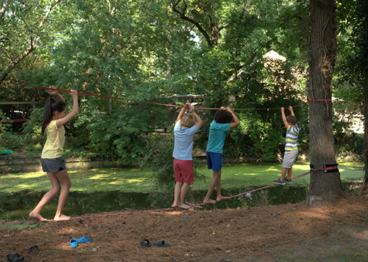 Kids playing in the yard.