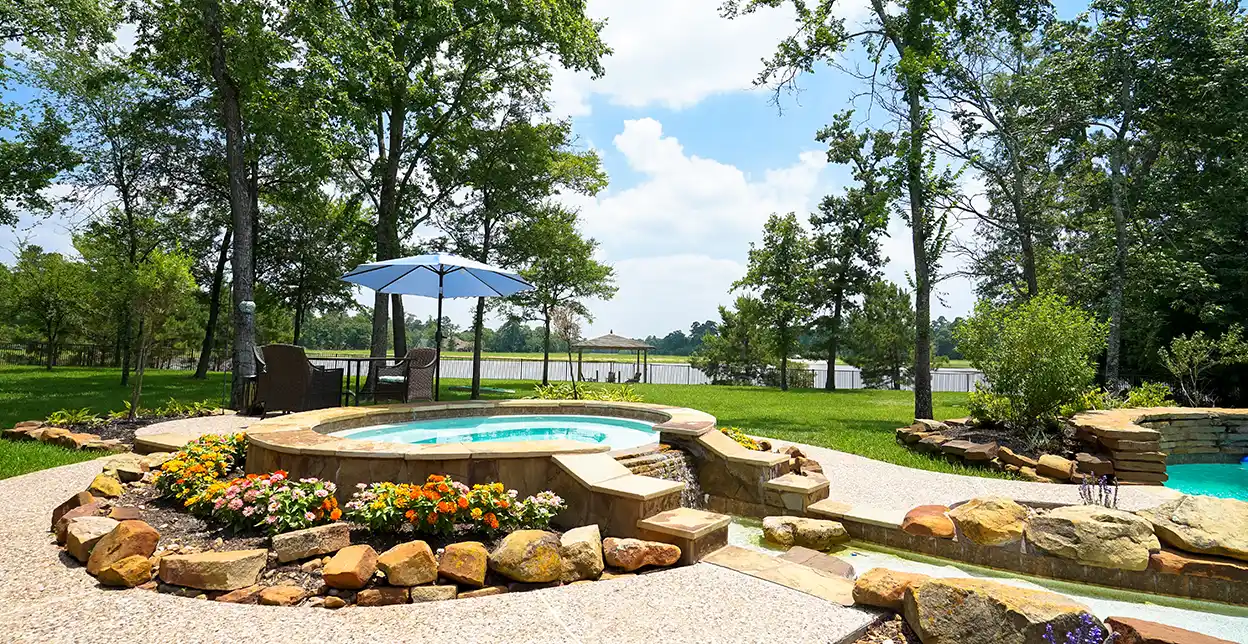 A picture of an inground pool in a backyard.