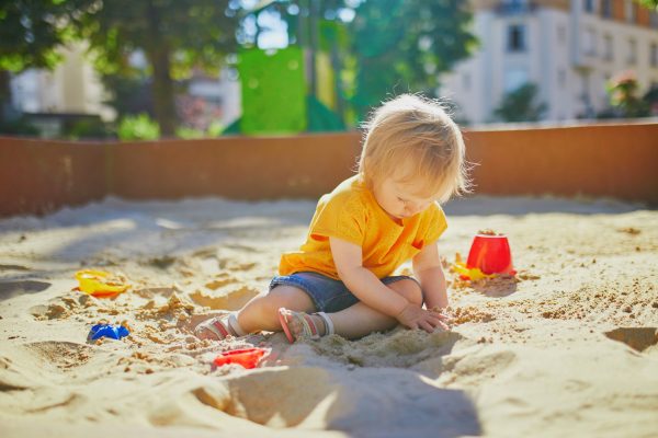 kid-playing-in-sandbox